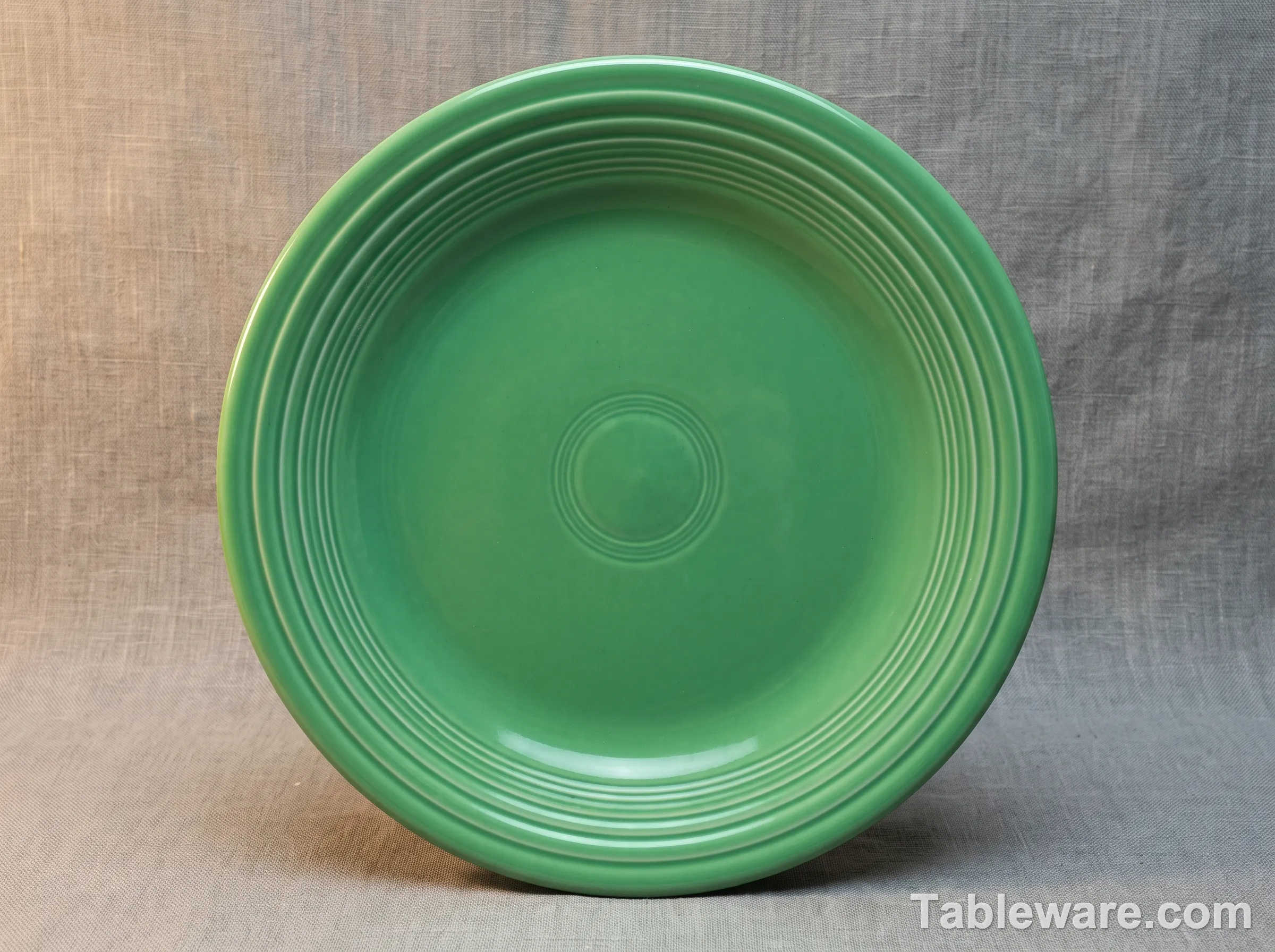 A single Medium Green Fiestaware dinner plate, the most collectible vintage color